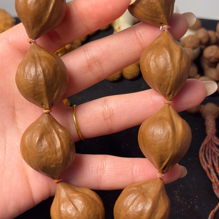 橄榄核手串梅林铁盒