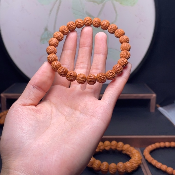 往***烟手串桃核龙纹桃核玉龙脊