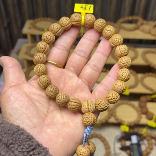 十***户木质野生桃核手串