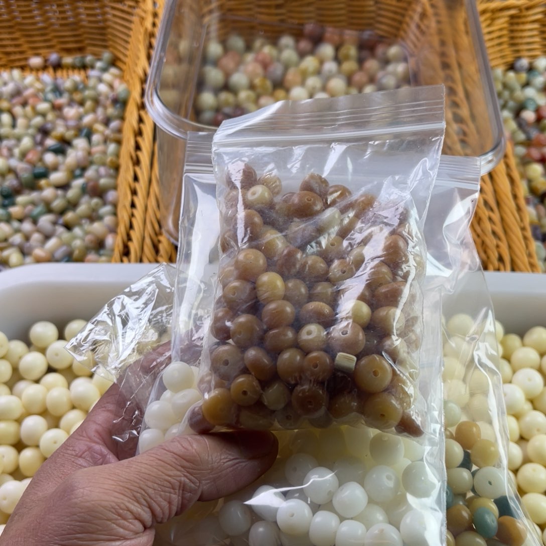 红***酒白玉菩提吊坠瑕疵拼