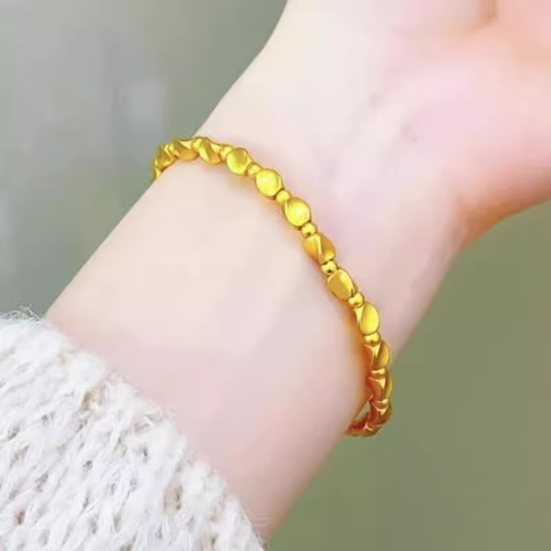 铜合金手链 扭转扭花素款圆珠弹力手链时尚气质手饰猫眼圆珠手链