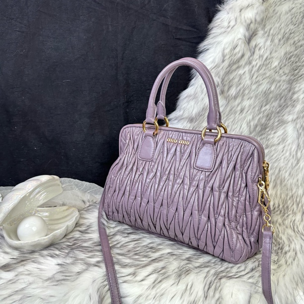 95新 MIU MIU/缪缪 紫色褶皱手提斜挎包