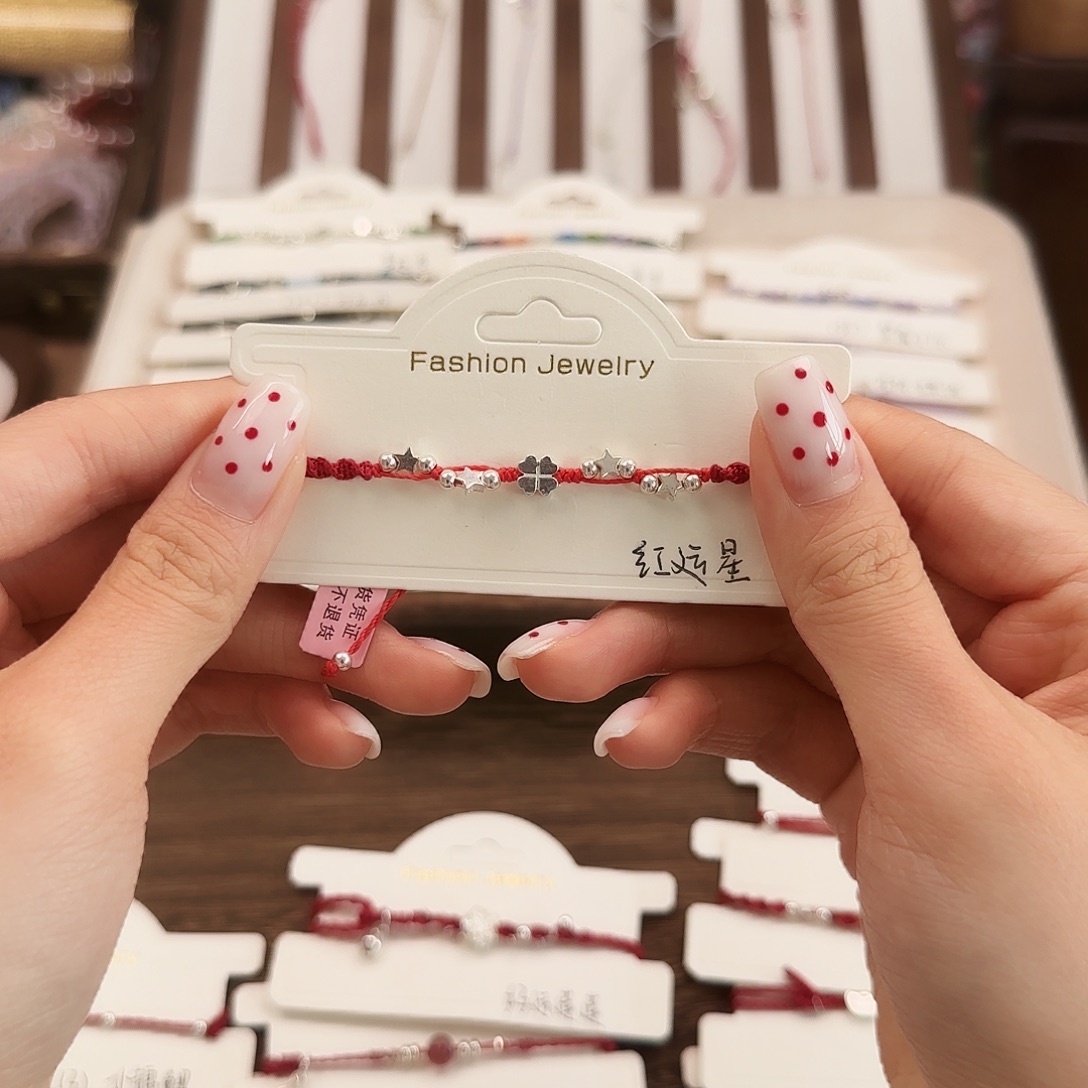 浮***生银S925镶嵌手链烟晶红运星
