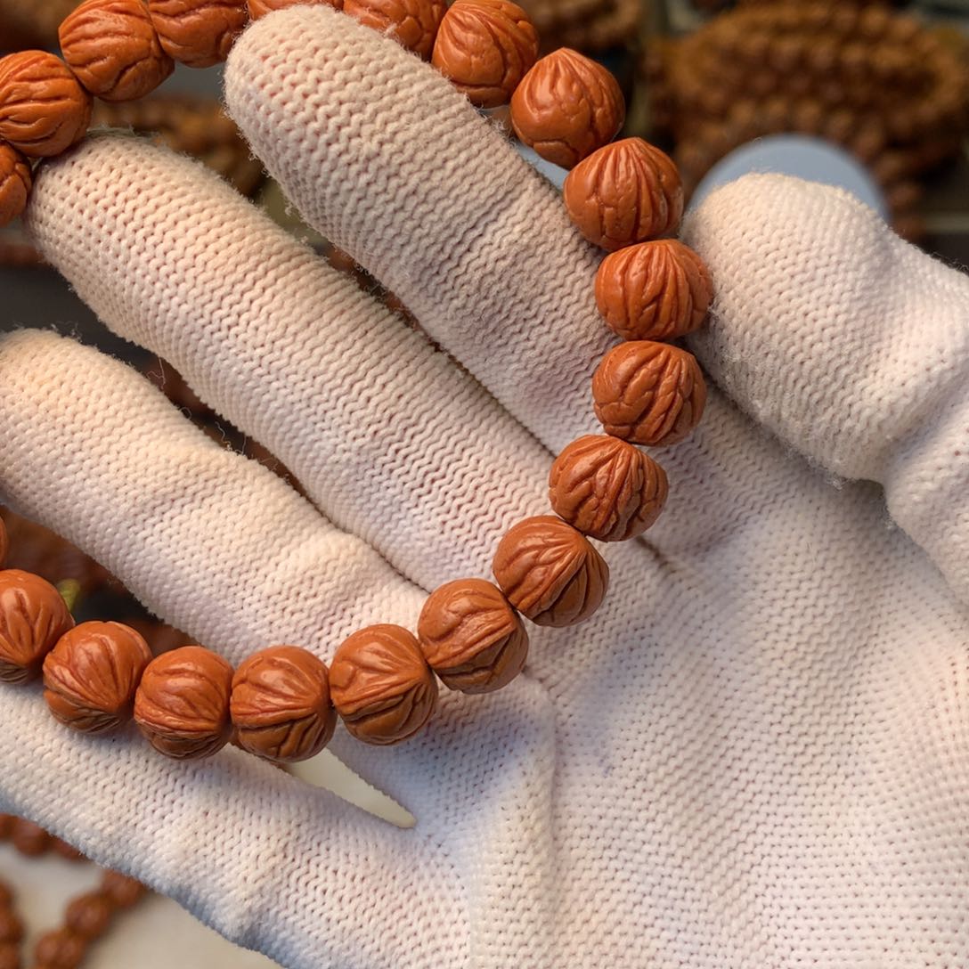 T***p桃核手串秦岭龙纹