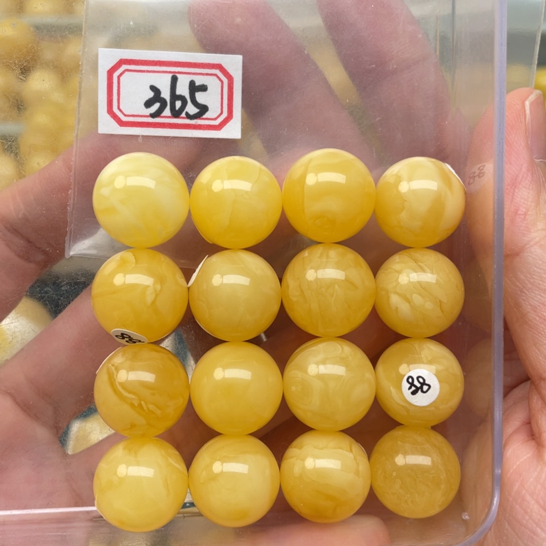 蜜蜡裸石未镶嵌亿*15+蜜蜡手串