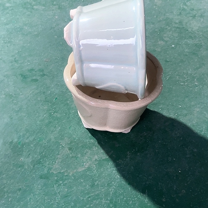 红陶口16。高11。。。。