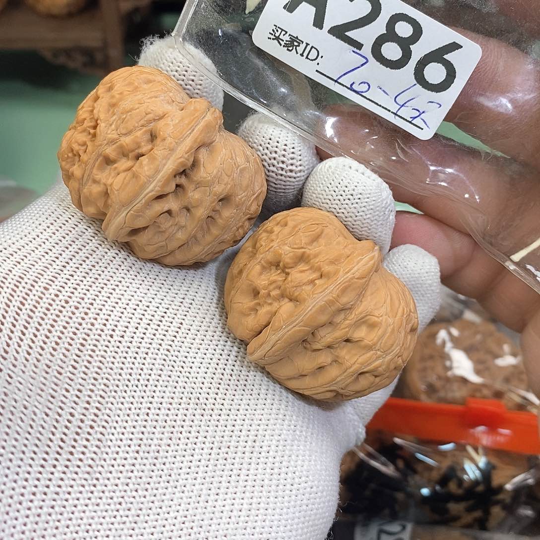 桃核把件40尺元宝。