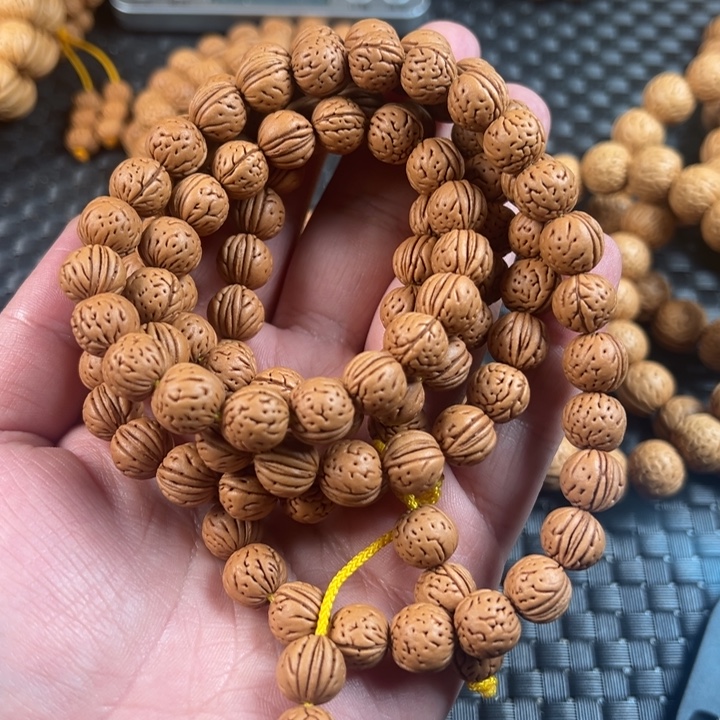 三***上吊坠桃核野生小金豆108