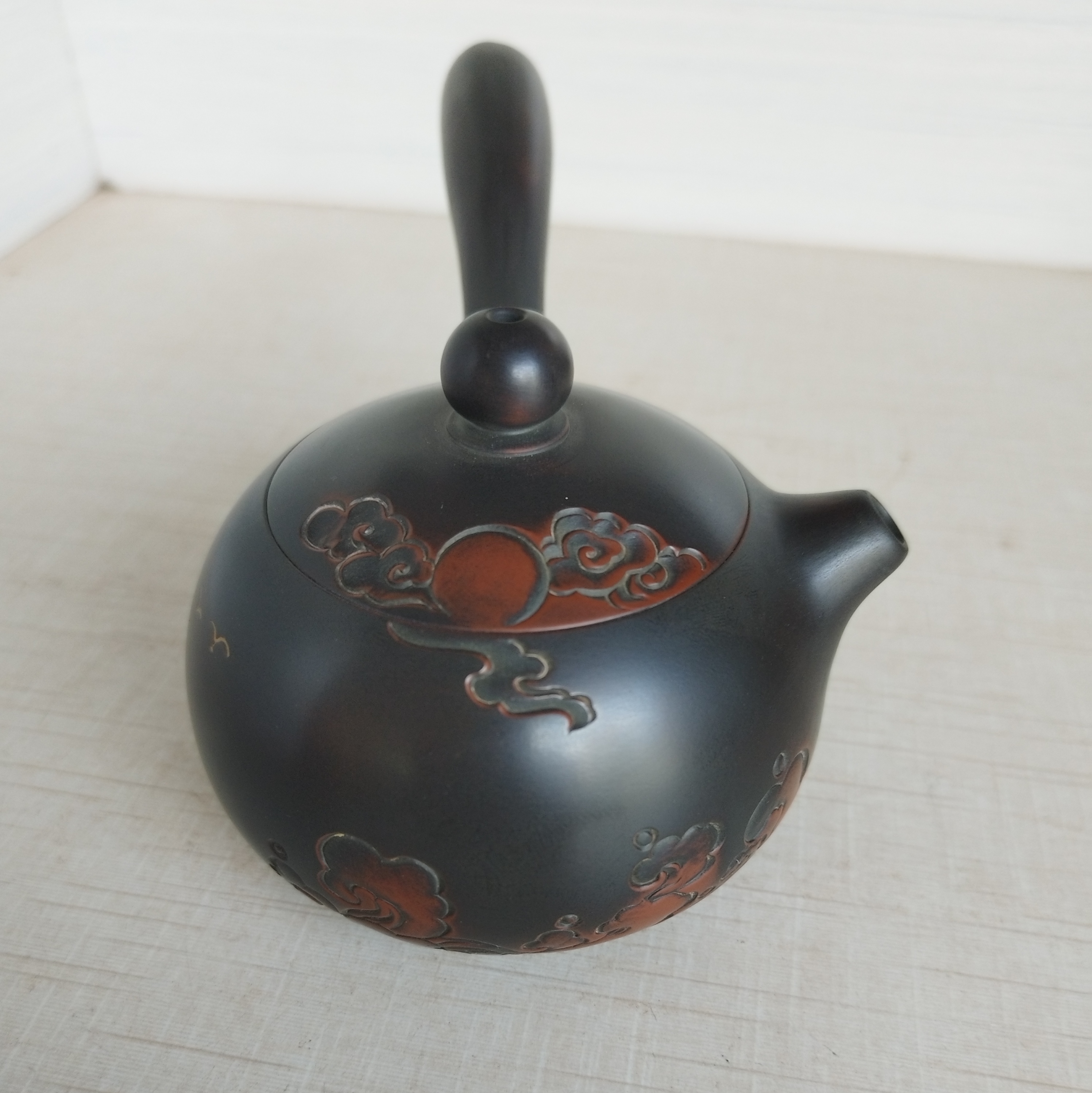 坭兴陶复刻海上生明月唐羽壶，纯手工制作容量200cc左右，黑古铜色