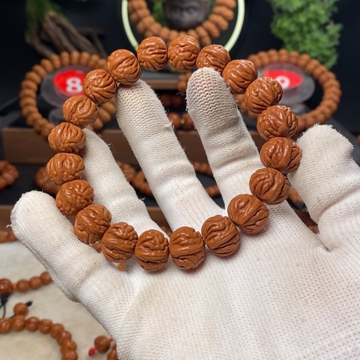 桃核吊坠A****）秦岭龙纹