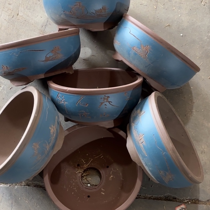 紫砂花盆100-7。  22.5-10.5