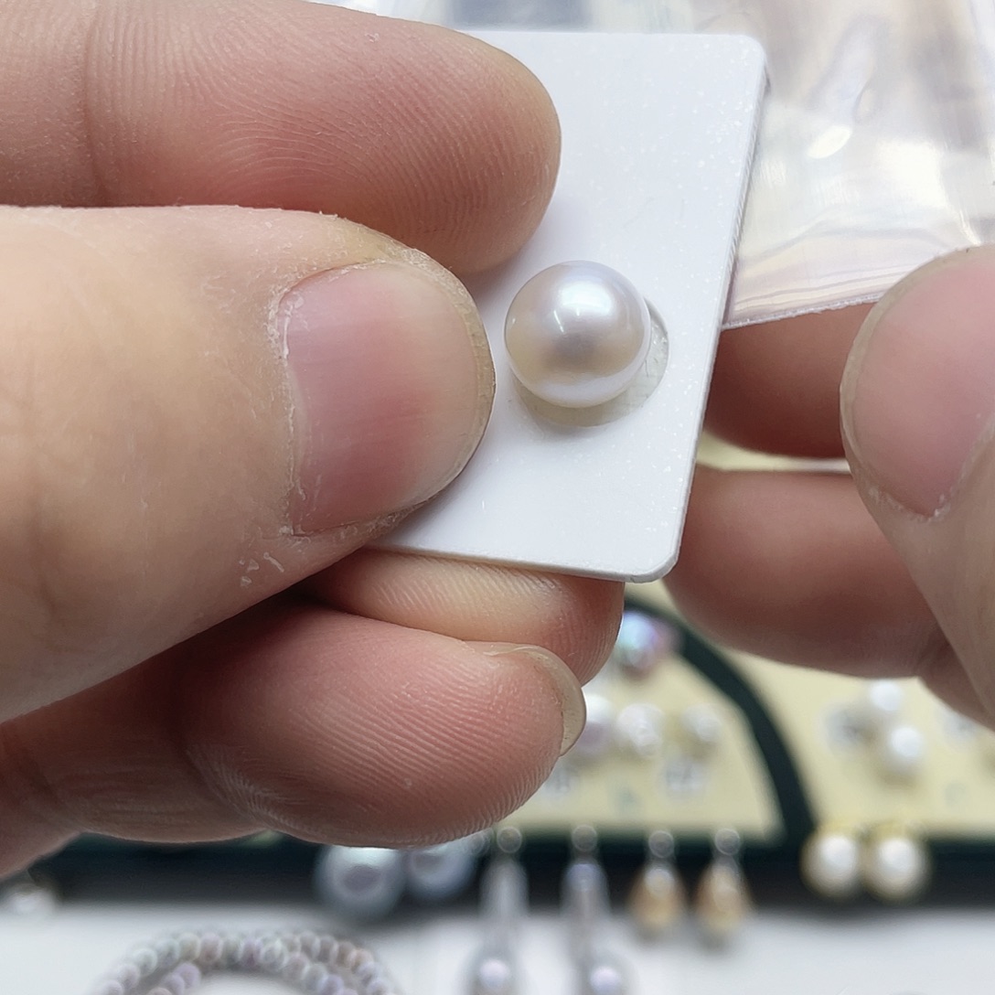 蛋***崽淡水珍珠银S925镶嵌耳饰