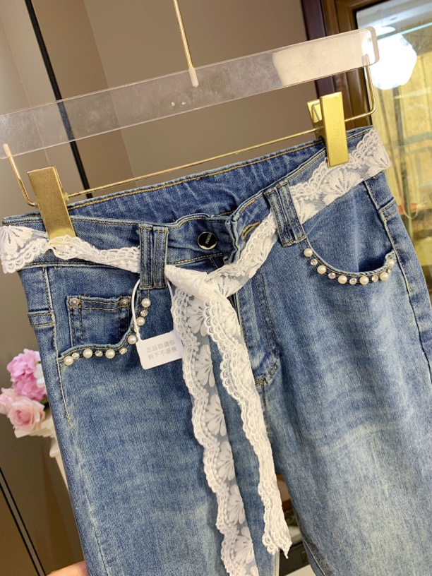 蕾丝拼接微喇牛仔裤女小众设计感显瘦拖地长裤