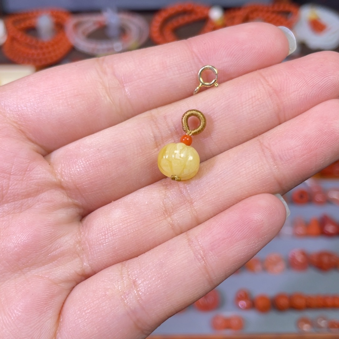阿***蕾蜜蜡未镶嵌裸石万能扣小南瓜