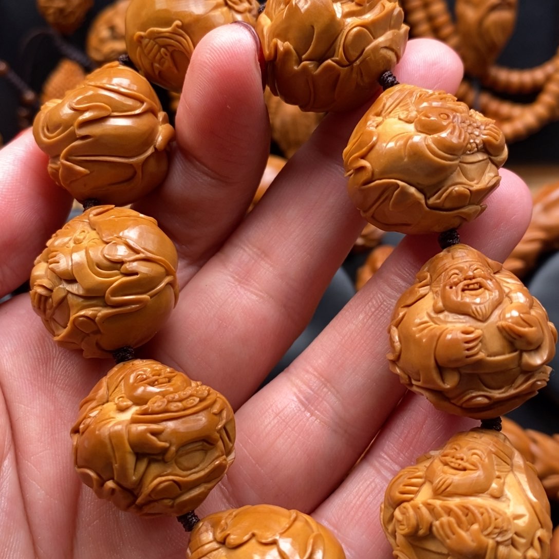 橄榄核手串芳**花荷叶财神