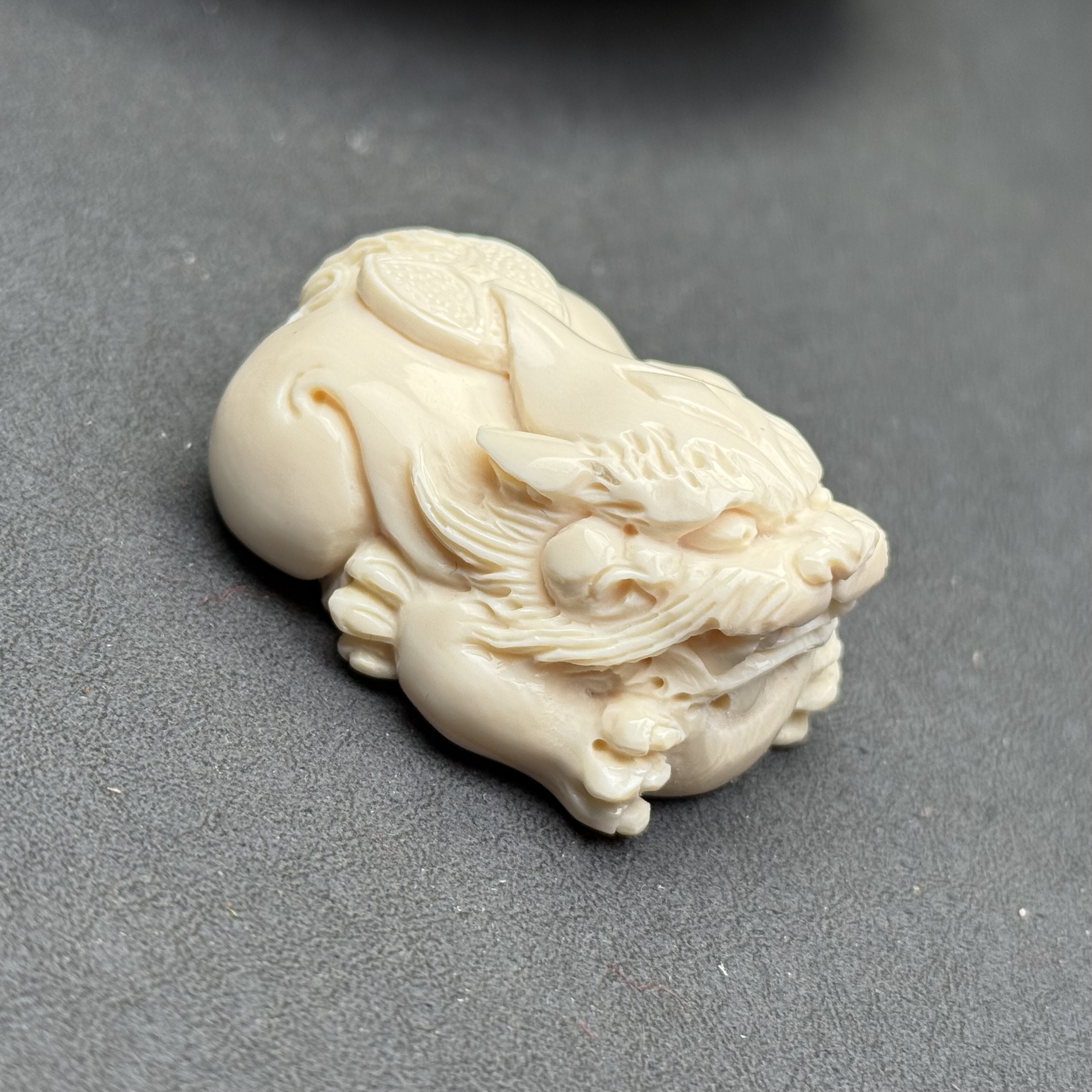 K9757天然猛犸牙 雕刻貔貅 23×45mm支持鉴定假一罚四