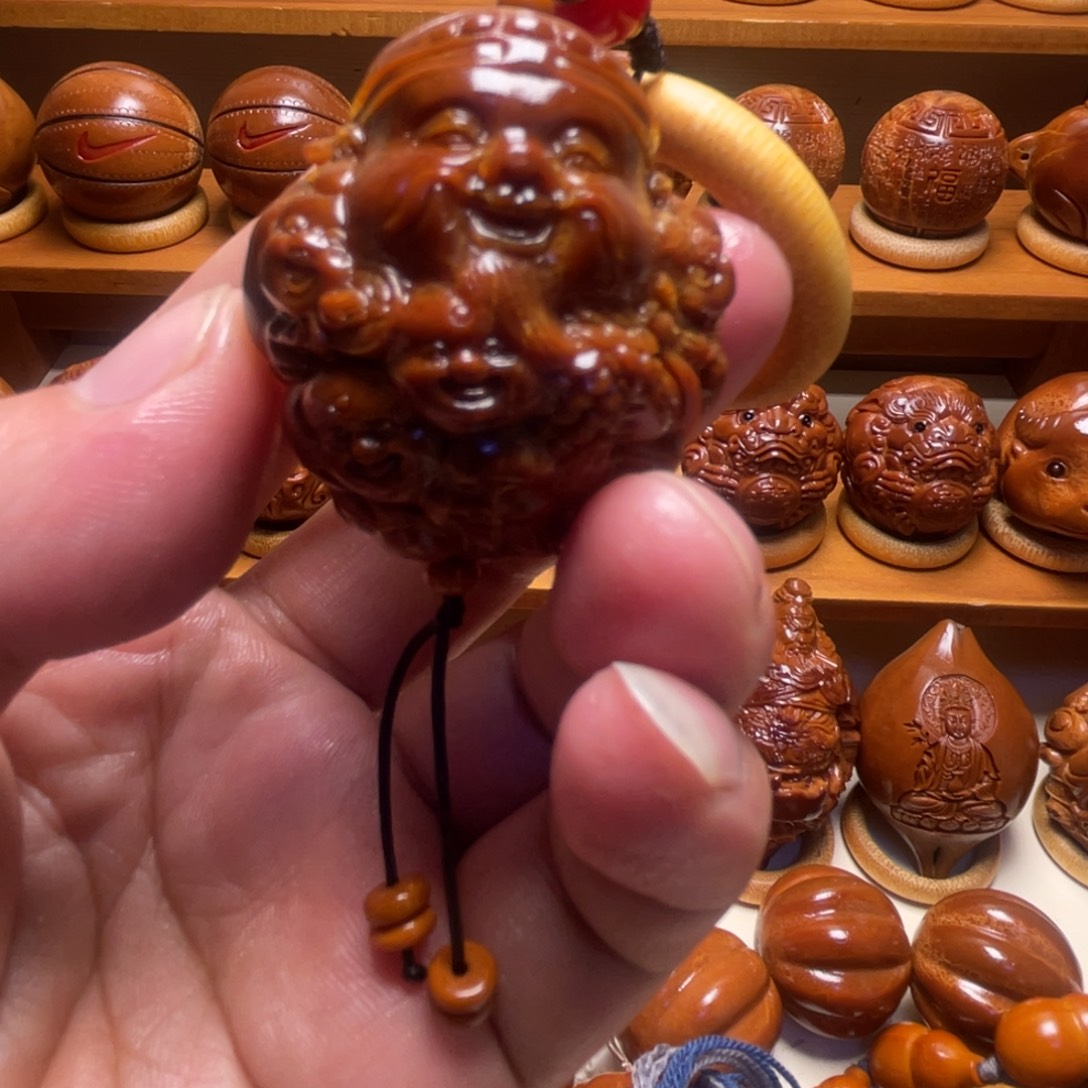 把件橄榄核39九子龙财