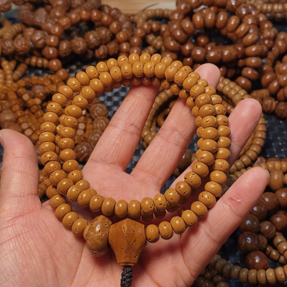 桃核手串古****】6/8尺挂