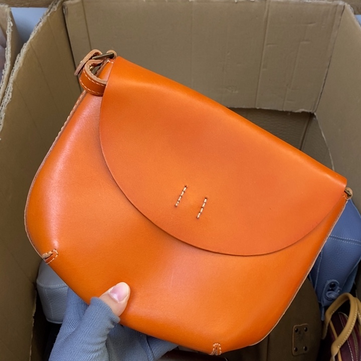 头层牛皮瑕疵单肩包