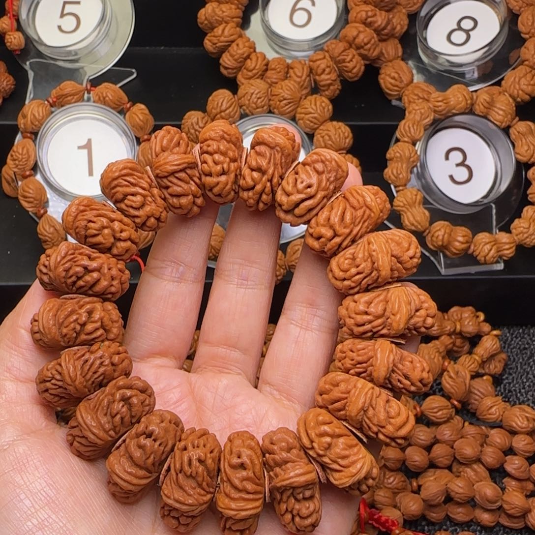 雪***松手串桃核秦岭刺龙