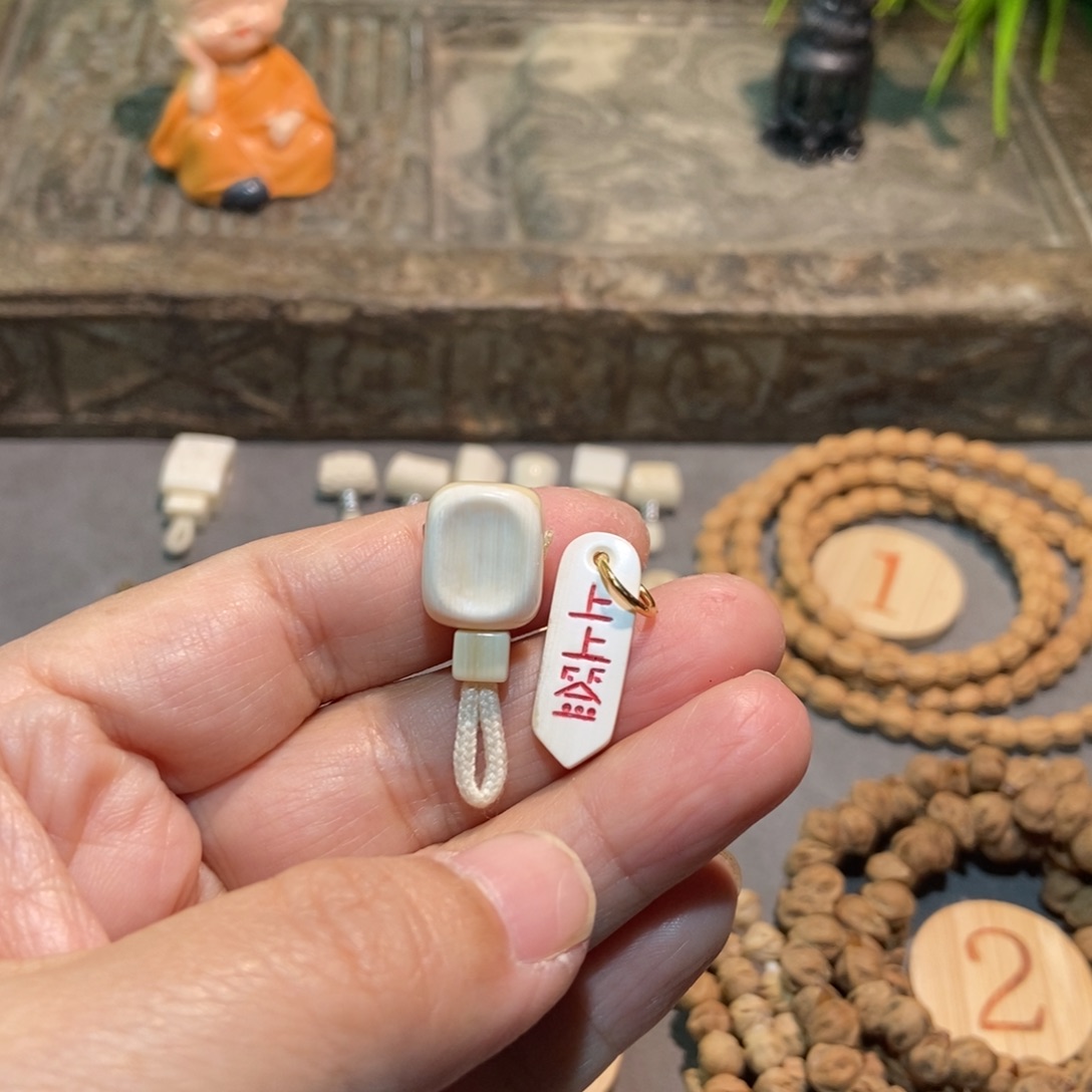 不***二柏香籽/百香籽吊坠