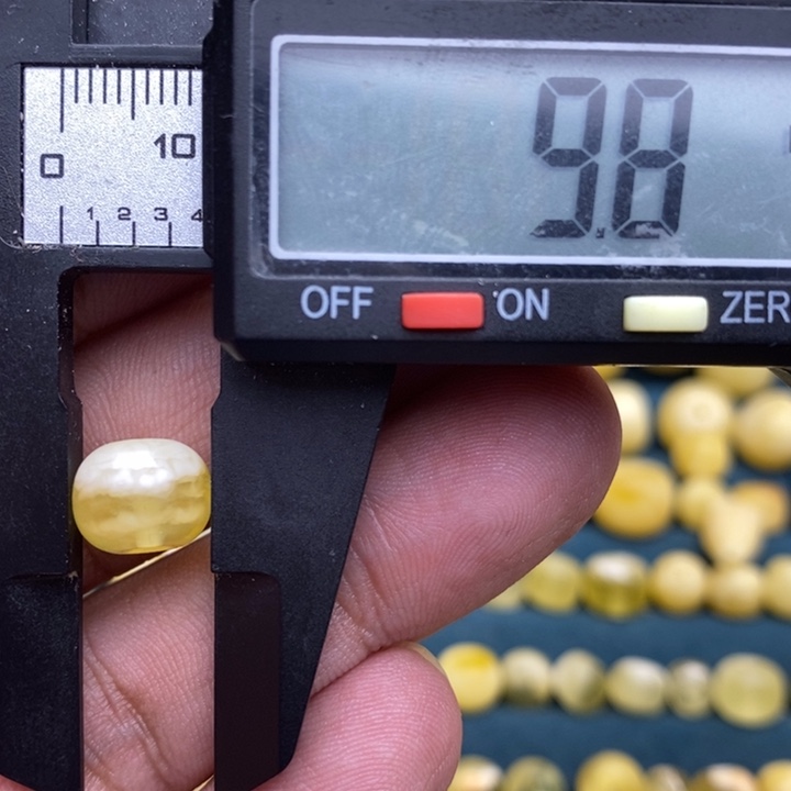 琥珀未镶嵌裸石35号9.8*7.7喇叭口