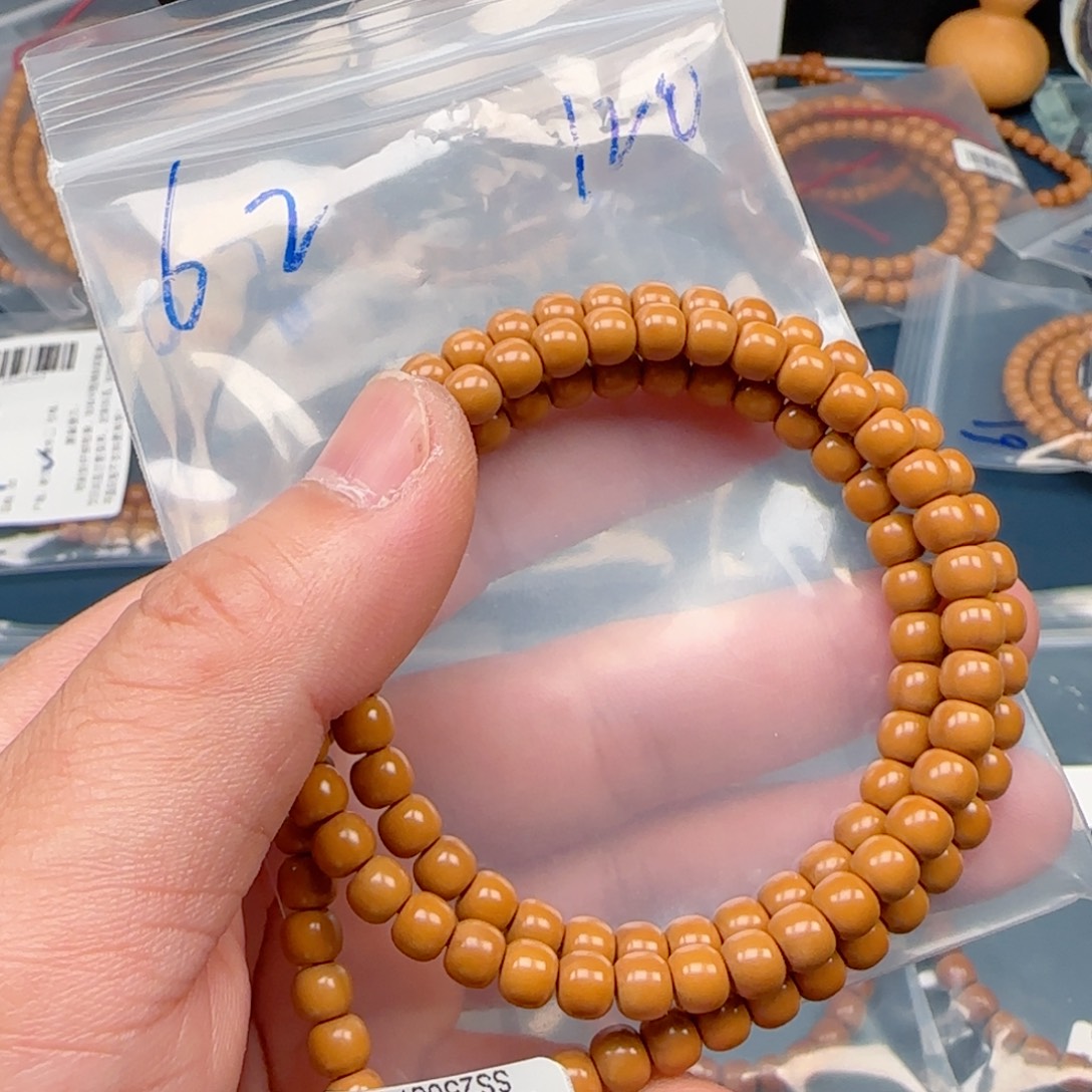 R***h手串橄榄核老挝SS级核尖极限弧尺寸6.2×120颗全无白