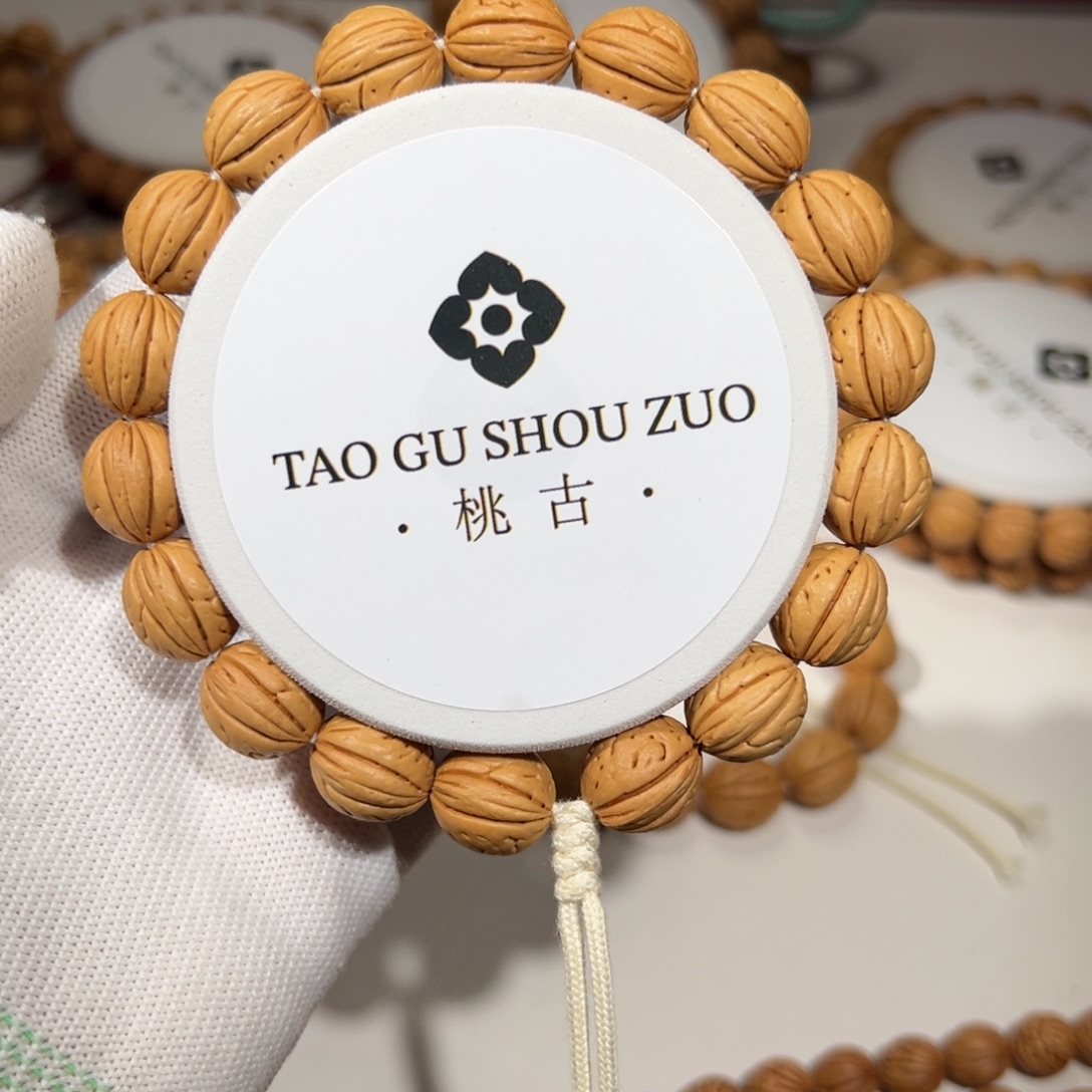 大***肌桃核吊坠野生桃核盘锦油蜡皮钱袋子12.5尺寸