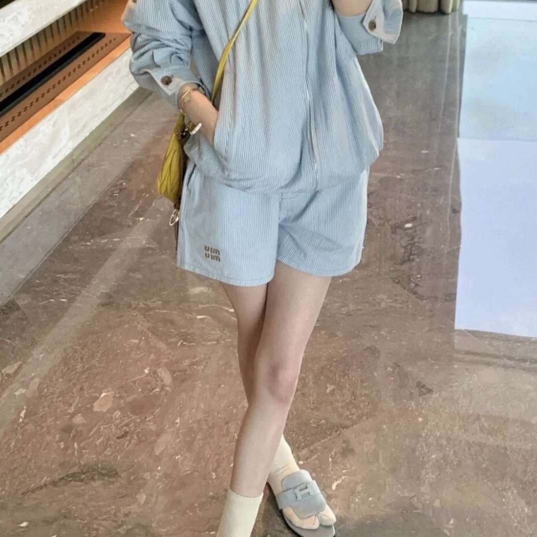 99新 MIU MIU/缪缪 au370/25ss徽标刺绣短裤 38码 棉