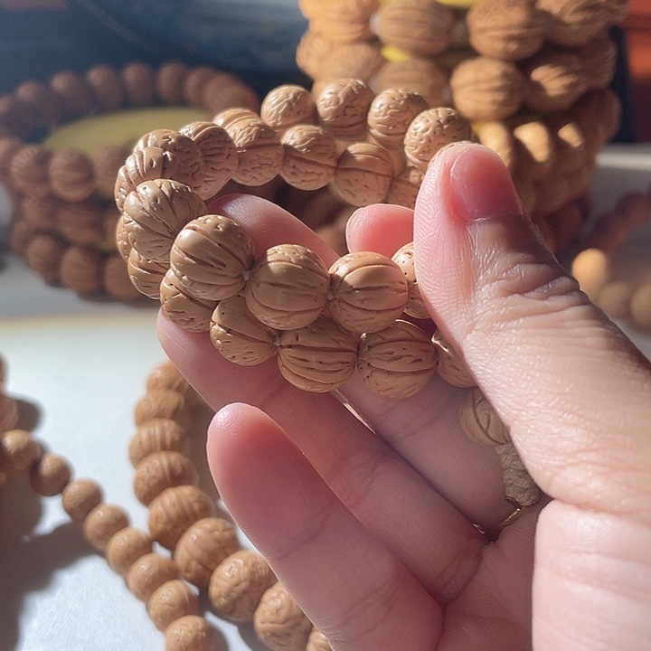 亻***戎桃核吊坠桃核手串野生20