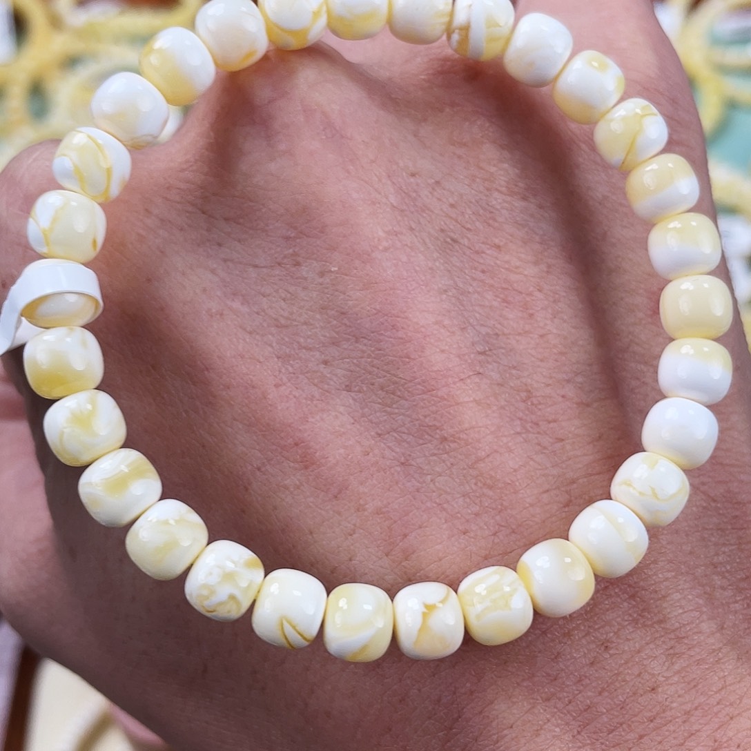 ****跑琥珀未镶嵌裸石7mm同料漆白手串