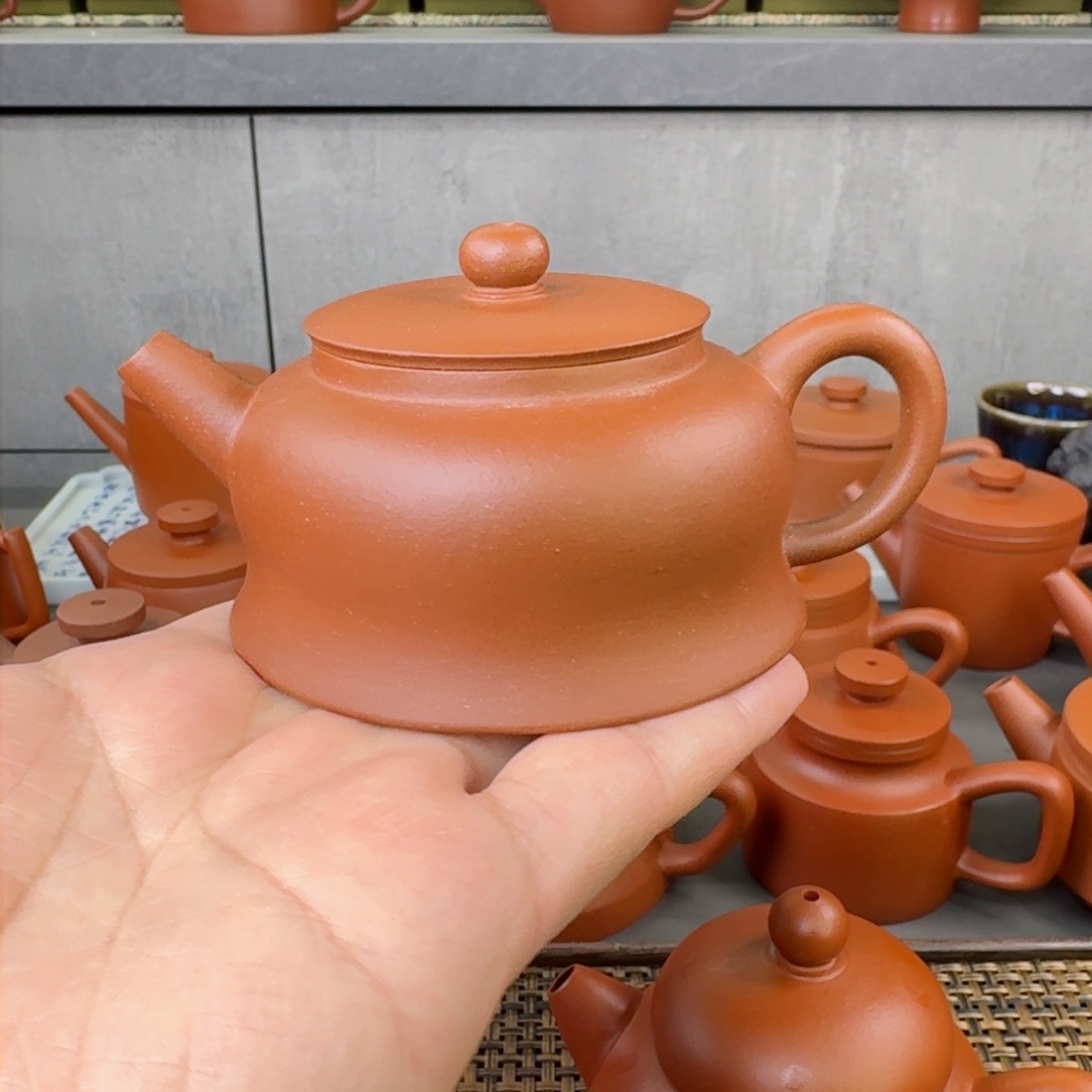 紫砂茶壶微瑕红降坡曲钟