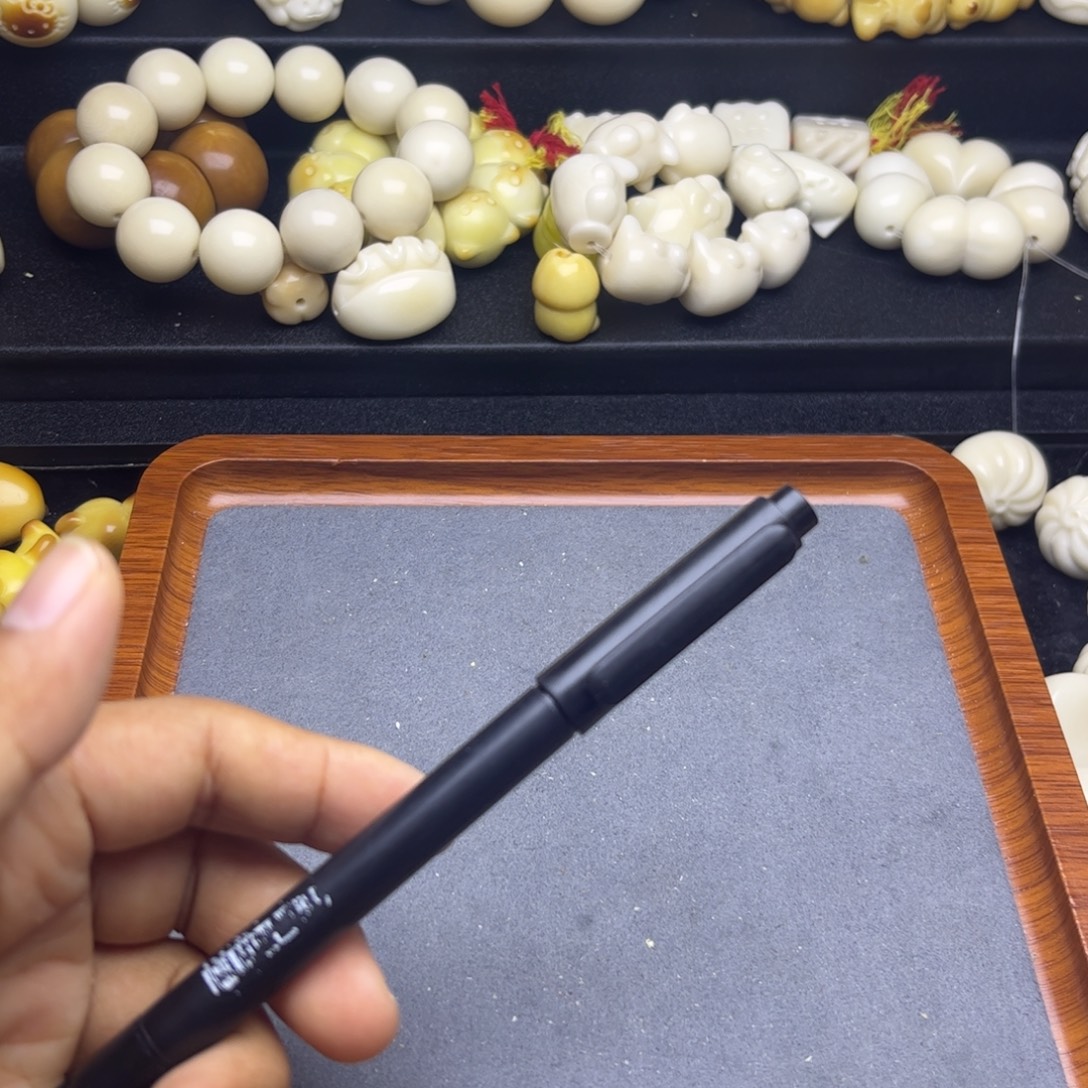 艾***.吊坠菩提根/象牙果