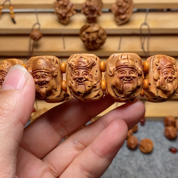 H****s桃核雕刻财神手牌
