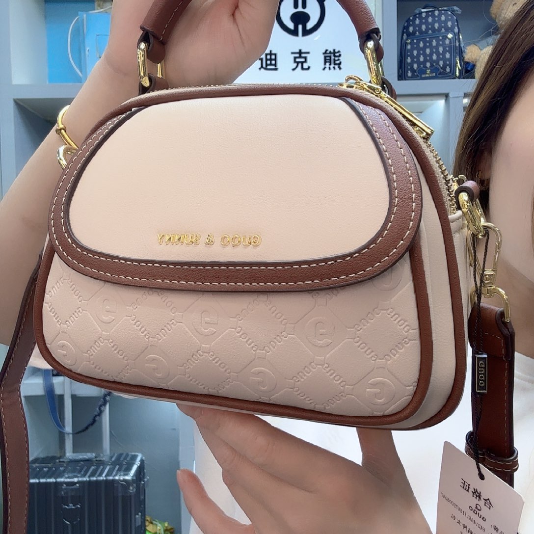 PVC8077奶茶蛇手提多层斜挎包