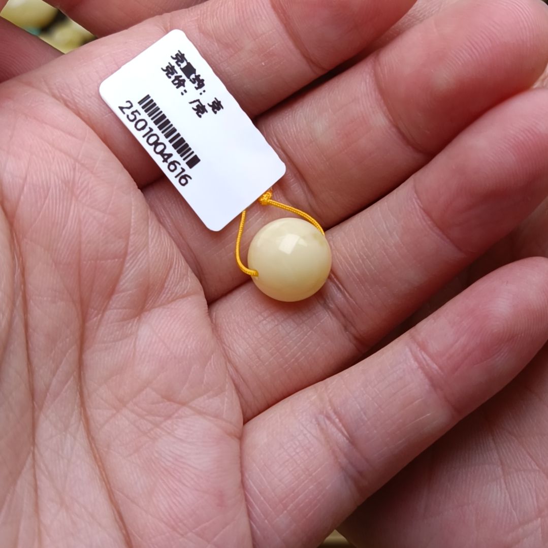 蜜蜡裸石未镶嵌日****?11圆珠