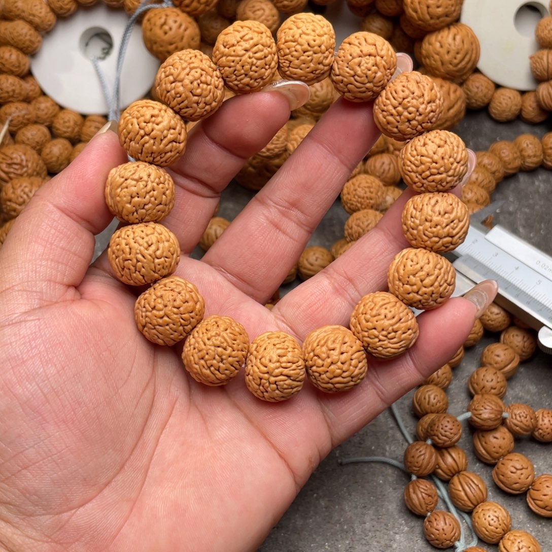 一***翀手串桃核龙鳞野凤闪11