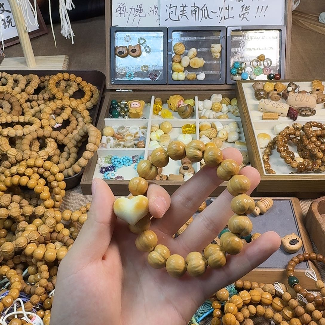忻****猴头核桃吊坠配饰象牙果爱心
