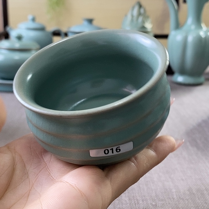 瓷片钱袋杯一一一一一一一暇