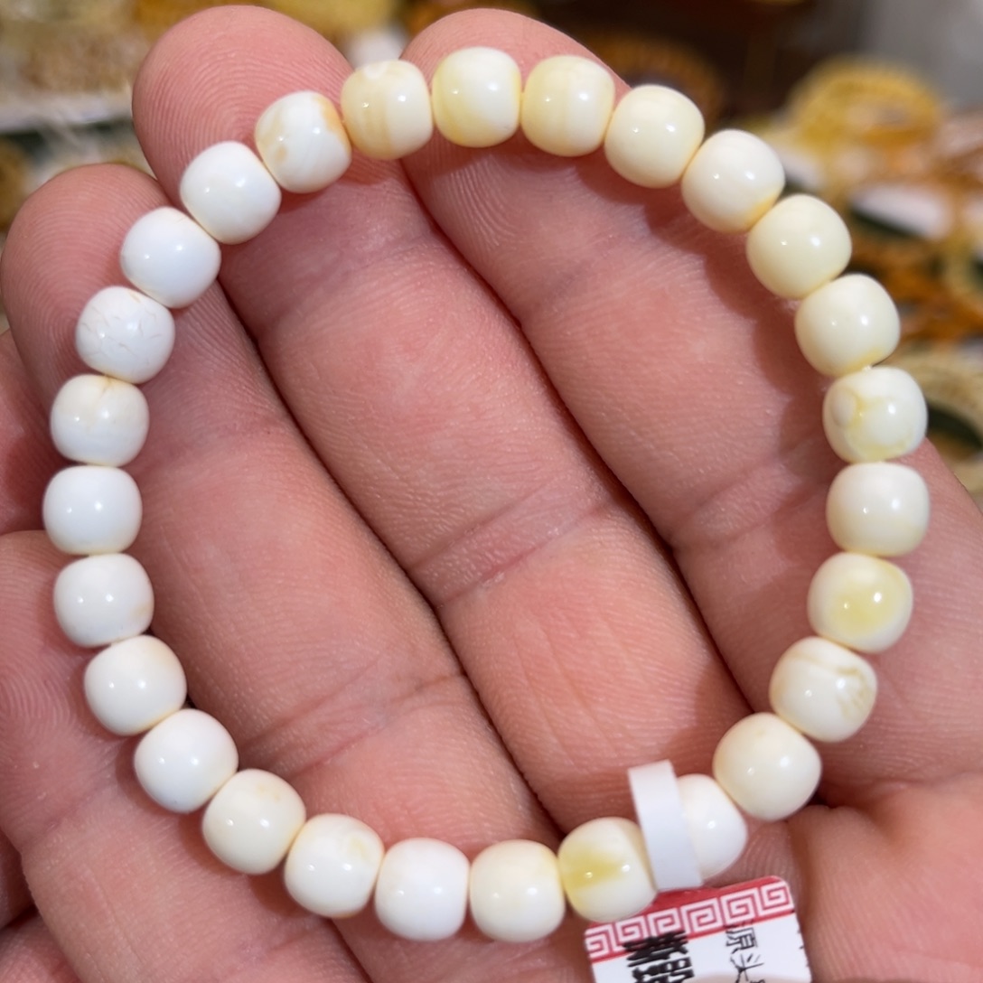 Y****蜜蜡未镶嵌手链微瑕瓷白满蜡妖花7.0mm