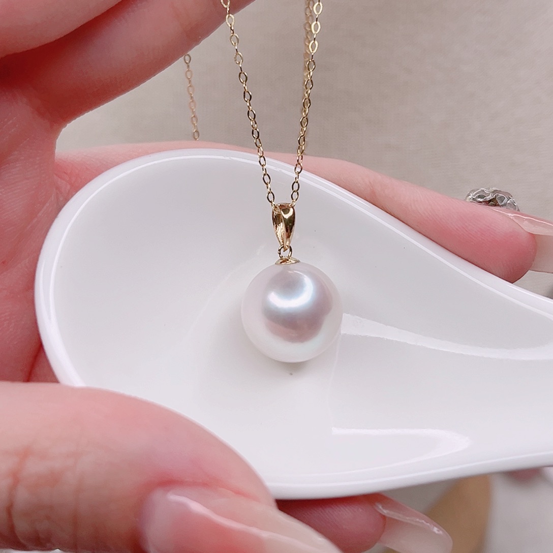 陈***晨淡水珍珠18K金镶嵌颈饰