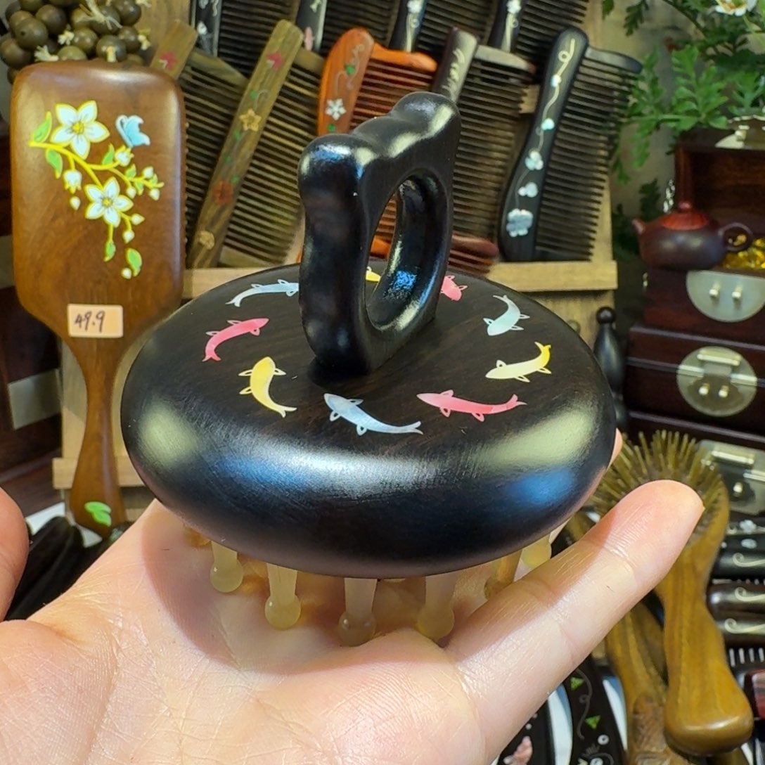 1***3羊角按摩梳紫光檀