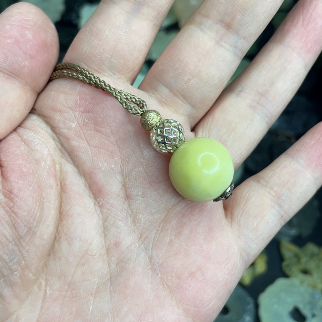 岫玉未镶嵌颈饰转运珠