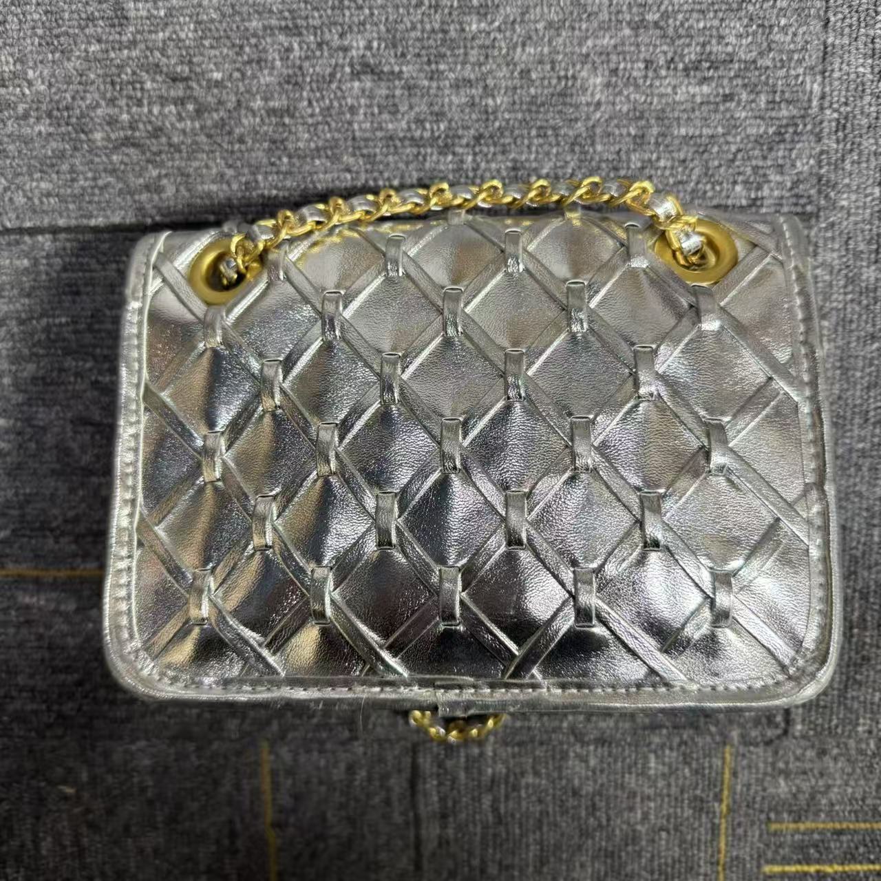 2025新款真皮女包编织银色