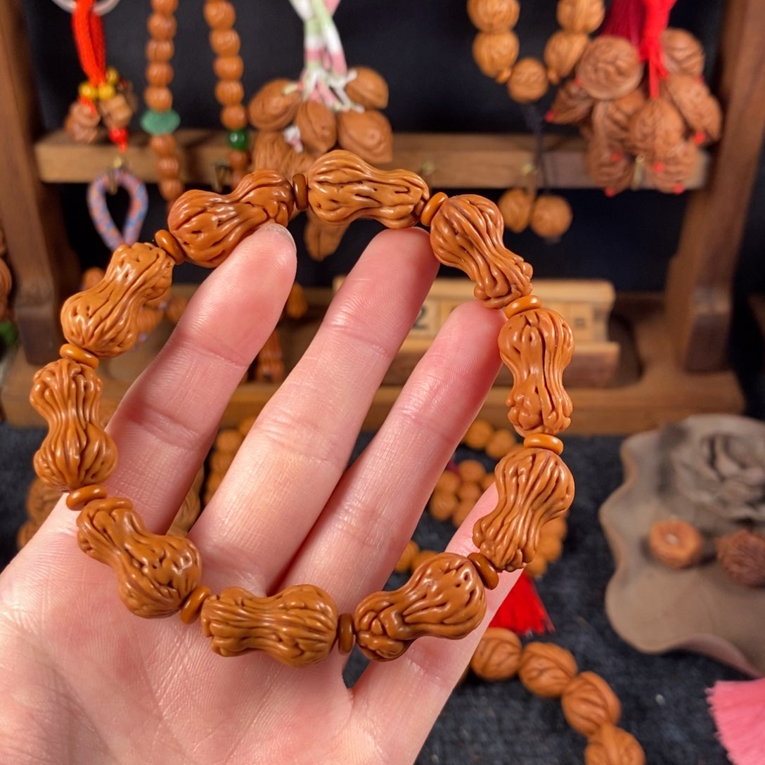 吊坠桃核桃枭手串