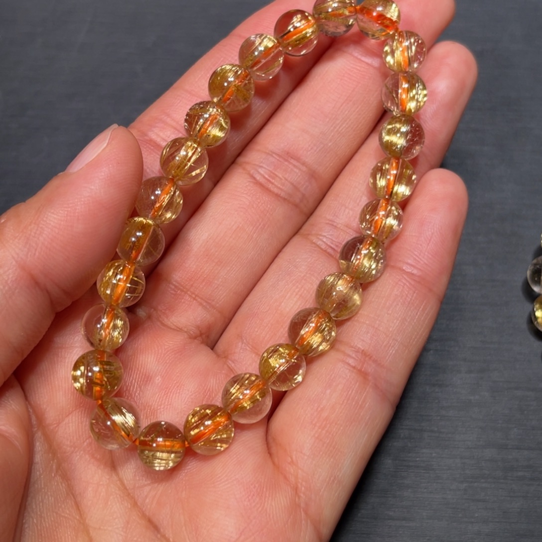 尧***尧水晶未镶嵌手串金钛晶