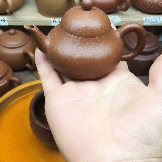 茶壶紫砂将坡泥梨100豪升左右