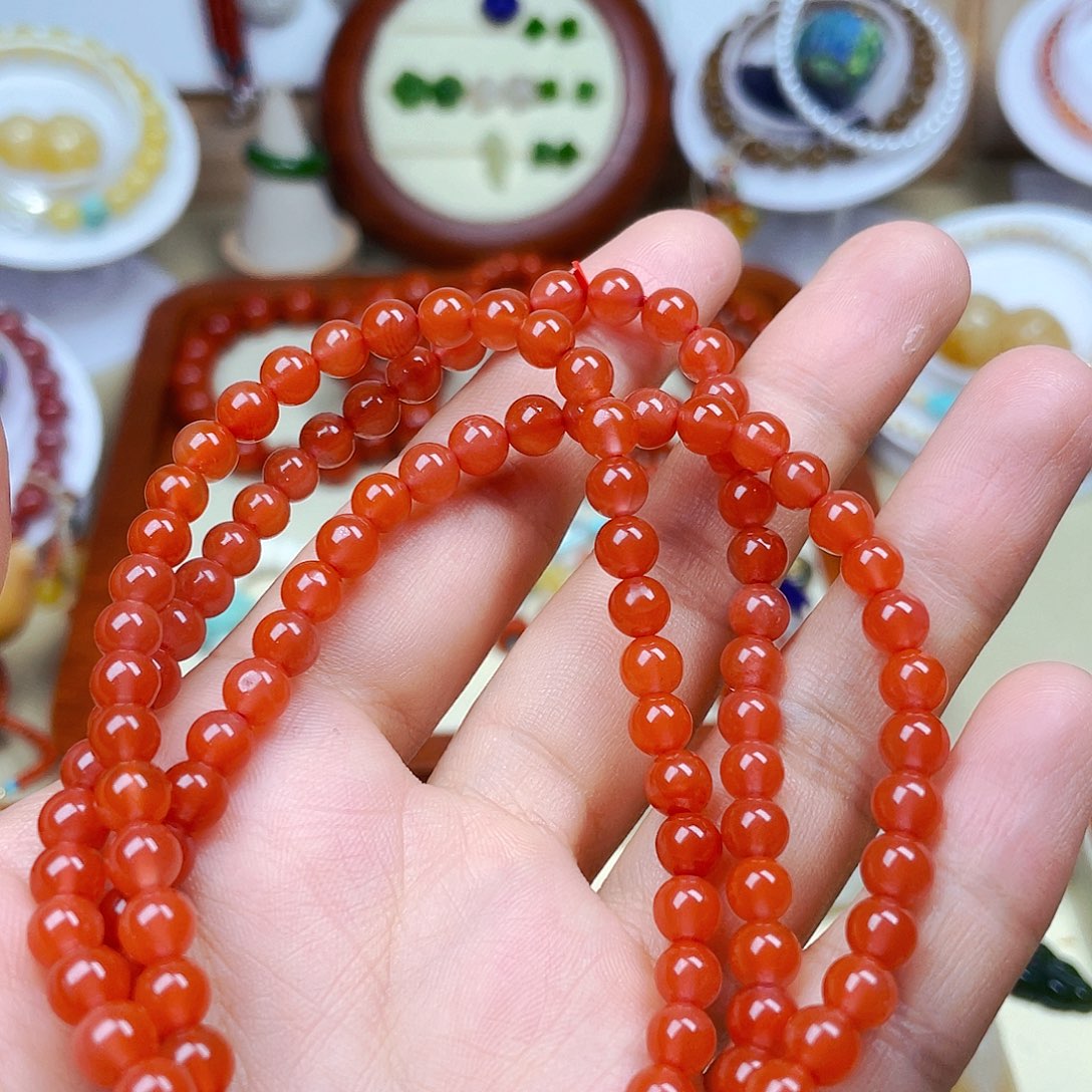 苏***姝南红玛瑙未镶嵌挂件拍3件