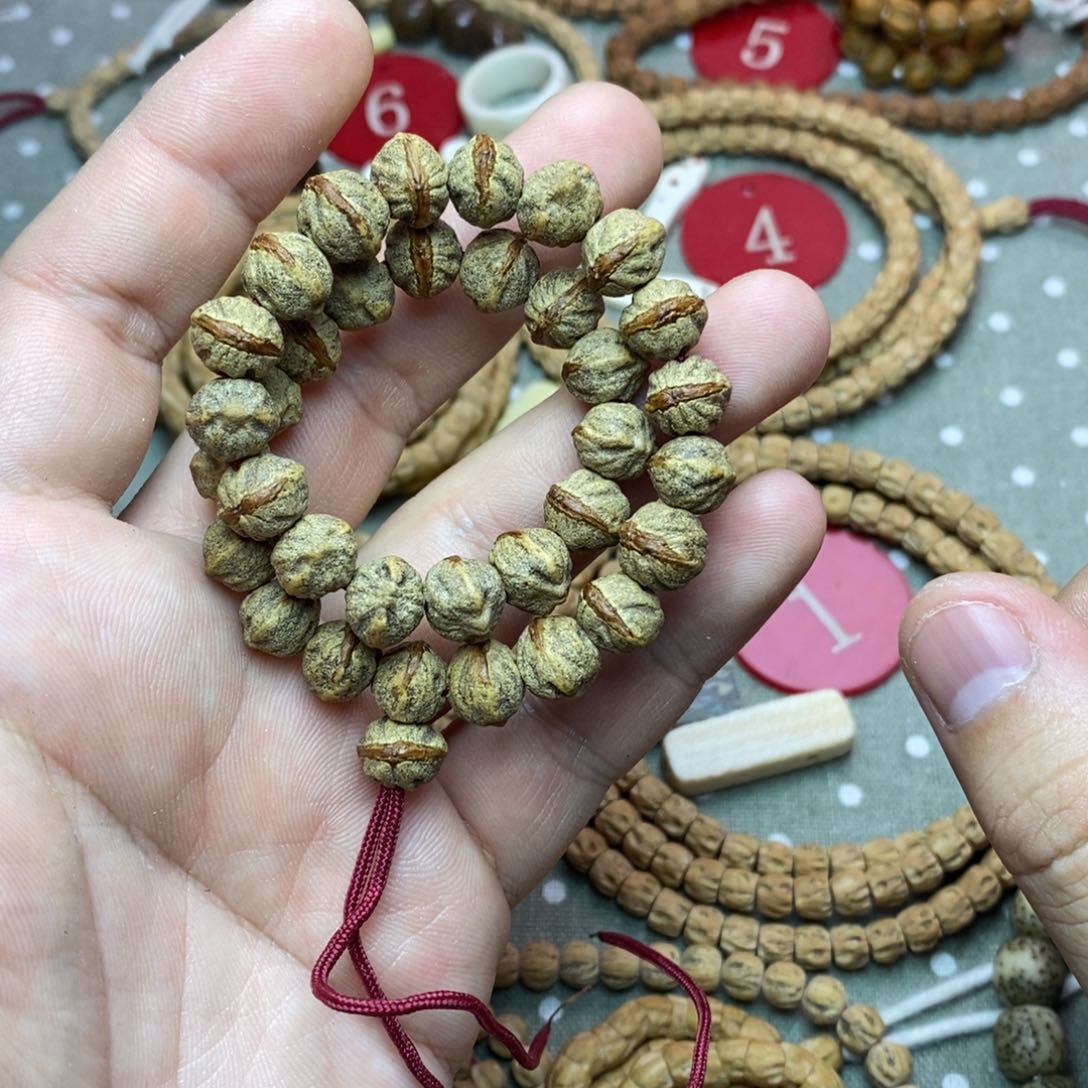 柏香籽/百香籽吊坠?红芽口横打手持9大+