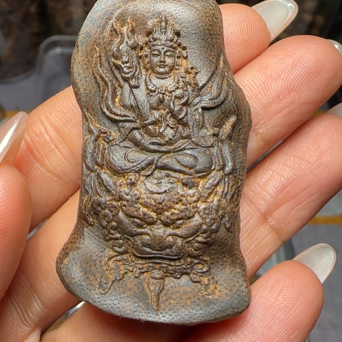 树脂制品风*杨乌身老包头